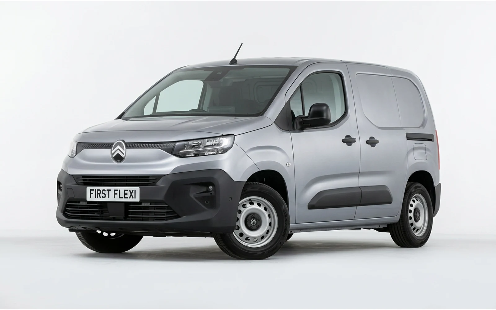Front three-quarter view of a silver Citroen Berlingo van.