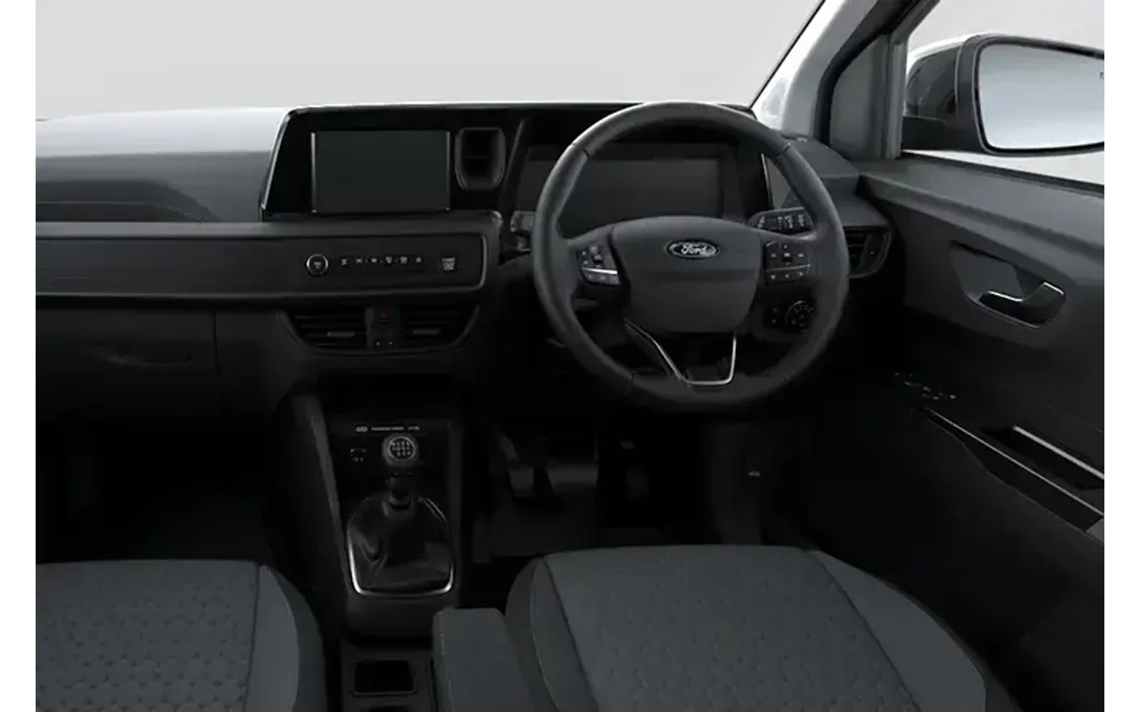 Interior view of a grey Ford Transit Courier dashboard and steering wheel.