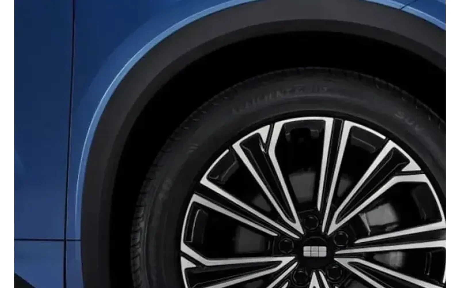 Close-up side view of a blue Geely Starray wheel and fender.