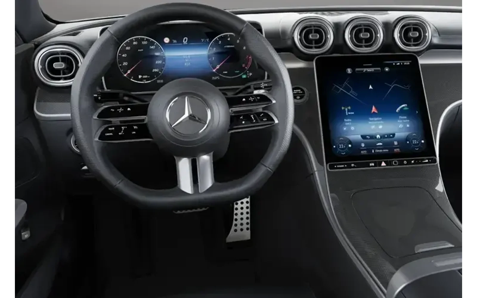 Interior view of a black Mercedes-Benz C-Class dashboard with a large infotainment screen.