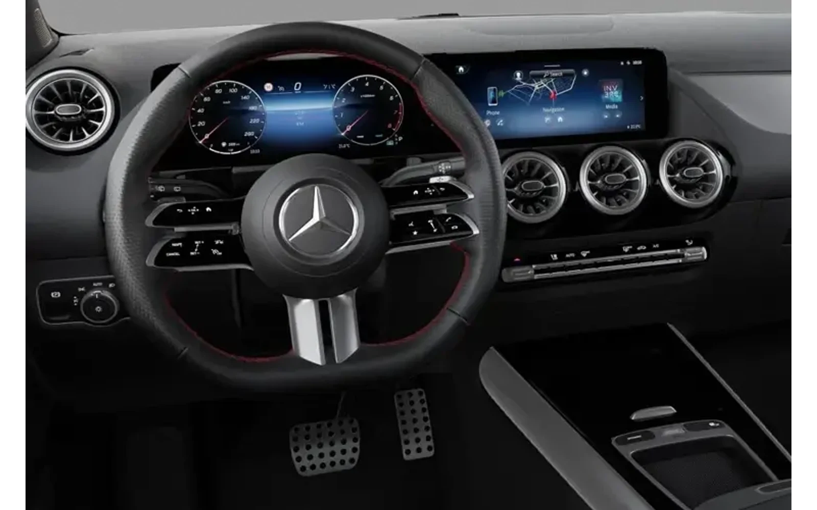 Interior view of a black Mercedes-Benz GLA showing the steering wheel and dashboard.