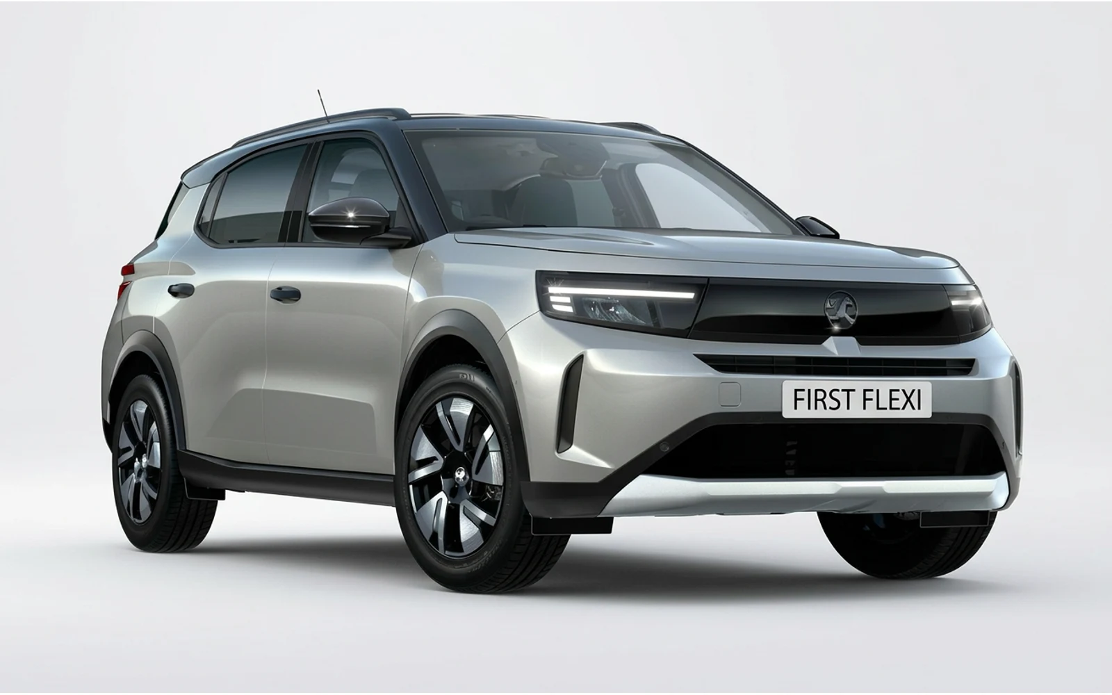 Silver and black Vauxhall Frontera Hybrid viewed from the front left.