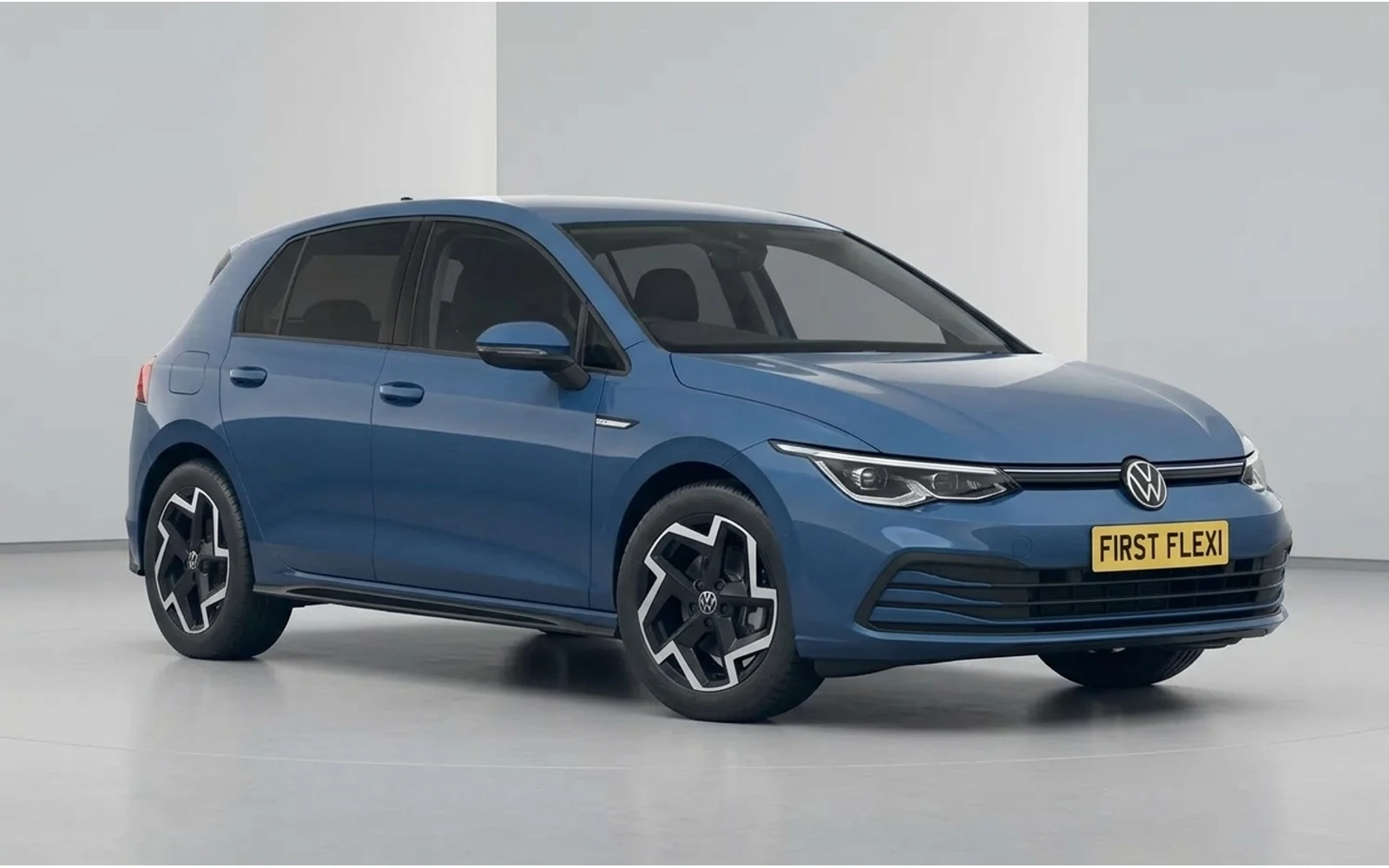 Blue Volkswagen Golf hatchback viewed from the rear right side.