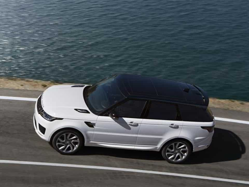 Range Rover Sport next to ocean