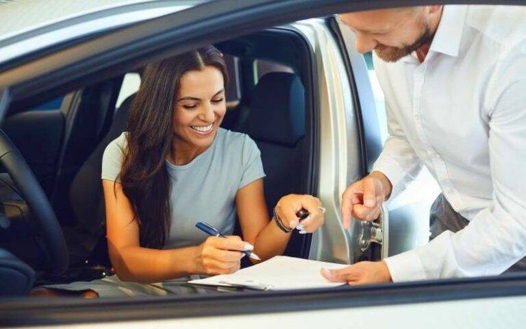 young woman buys a car in a car showroom